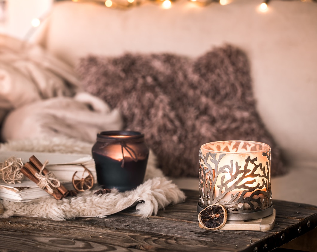 still-life-home-atmosphere-interior-with-candleson-background-cozy_169016-6148